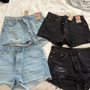 Levi's Jean Shorts Blue and Black Distressed Cut-Offs